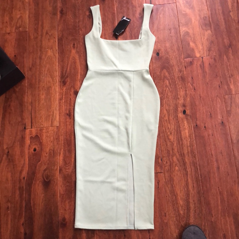 Pale green form fitting dress